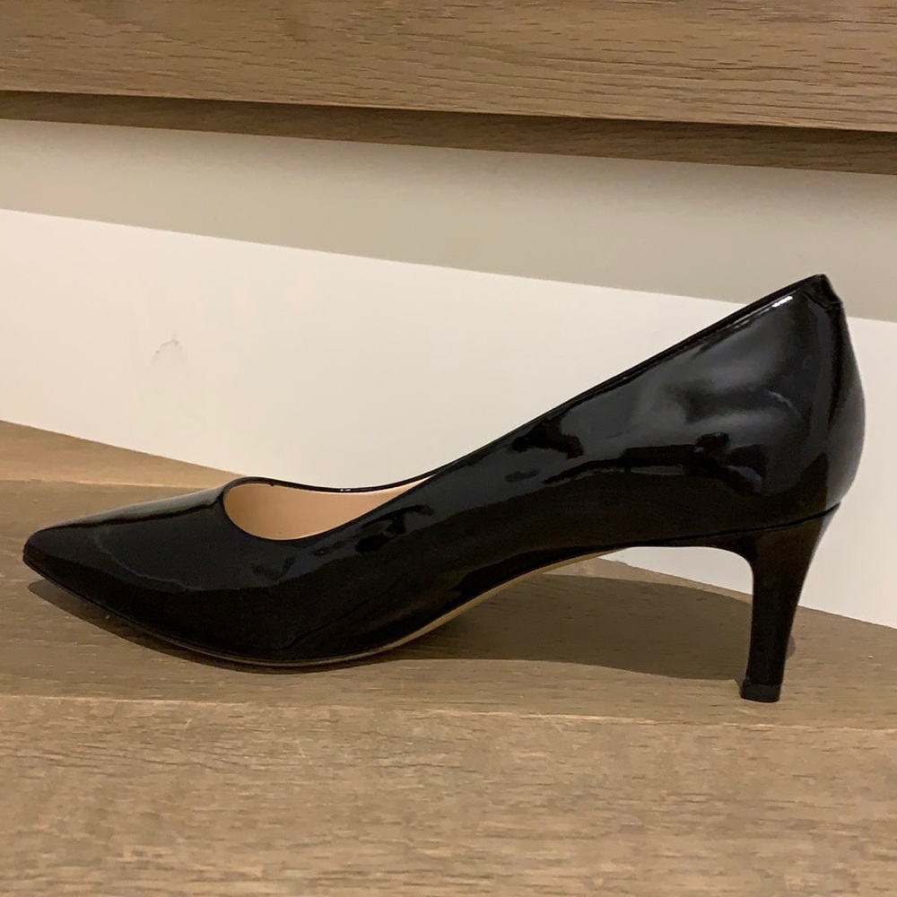 Purchased in Milan , new , gorgeous classic black patent pump .2” heel